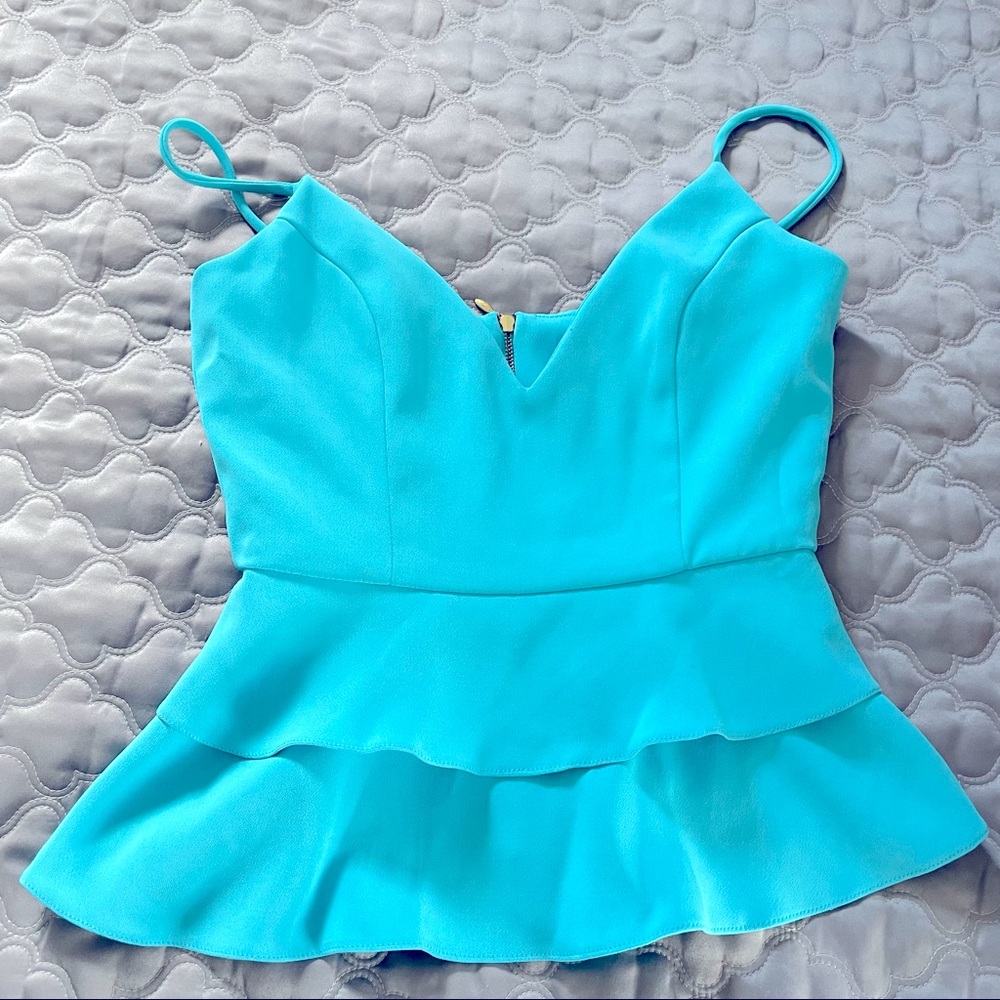 Vibrant neon light blue tank top ruffle peplum top deep v neck